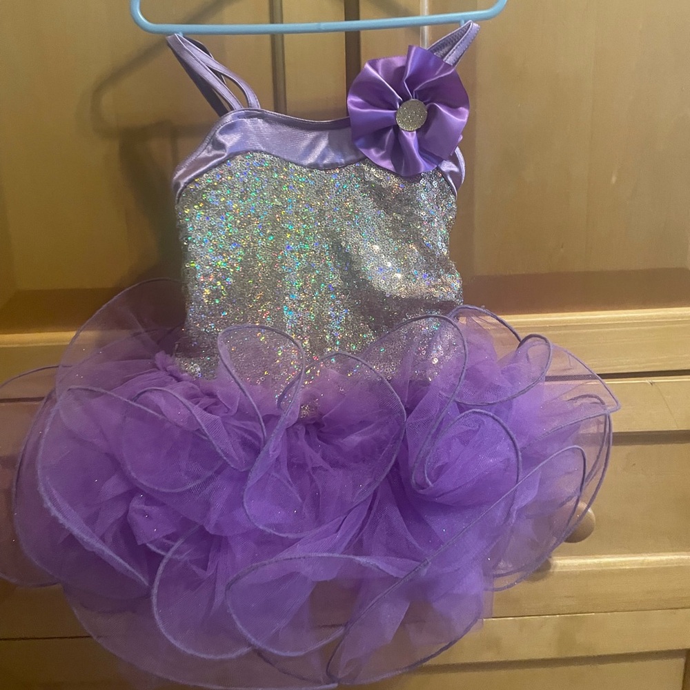 Weismann SC leotard with sparkly top and wired toole skirt.